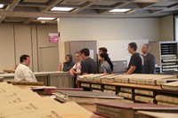 wide shot of students learning about book records