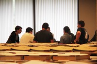 far shot of students learning about book records