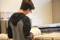 student looking at mortgage book