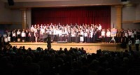 middle and high school choruses singing