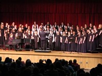 wide shot of students singing