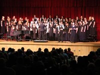 wide shot of students singing duet