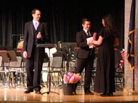 additional student receiving recognition flowers