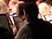 up close of students playing instruments