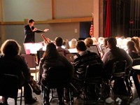 medium shot of students playing instruments