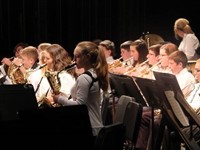 medium shot of students playing instruments