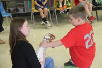 student petting goat 2