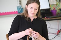 instructor showing students goat teeth