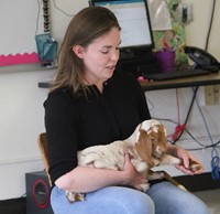 instructor showing goat hoof