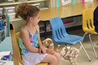 student petting goat 1