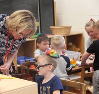 students and teacher in classroom