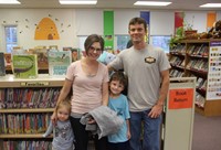 family in library