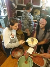 Chenango Valley French Exchange students making spaghetti