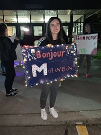 Chenango Valley student holding welcome sign