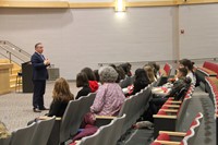 superintendent speaking with french exchange students