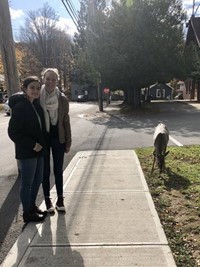 students standing near deer