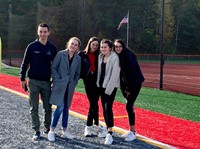 students standing on chenango valley turf