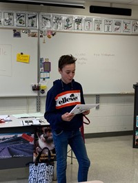 student speaking in classroom