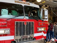 student in fire truck