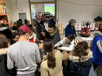 students helping in chow warehouse