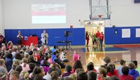 wide shot of students learning about integrity