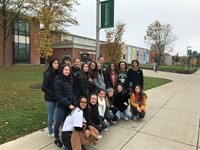 students outside of binghamton university building