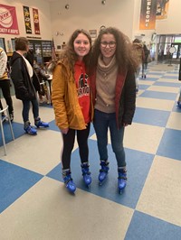 students wearing ice skates