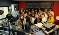students and teachers in radio station studio