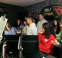 studios talking to radio station host