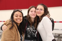 three french students smiling