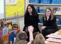 french students talking to elementary class