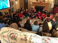 students playing game in living room