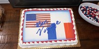 cake that says bon voyage