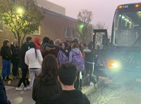 people giving goodbyes to french students and teachers