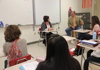 honoree maureen pratt roberts speaking to class