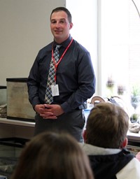 distinguished community member robert stapleton speaking to class