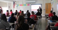 honoree gary butch speaking to class