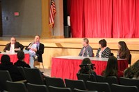 honorees speaking at middle school event