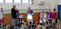 honoree adam cornell speaking at chenango bridge elementary event