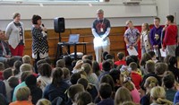 honoree maureen pratt roberts speaking at chenango bridge elementary event