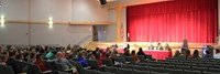 honorees speaking at middle school event