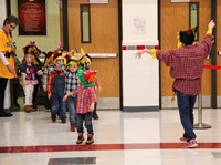 wide shot of pre k halloween parade