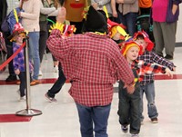 students and teacher in parade