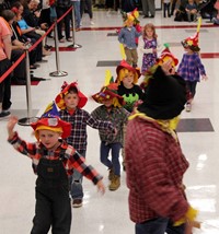 students and teacher in parade