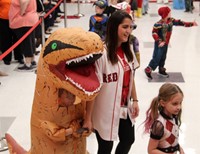 students and teacher in parade