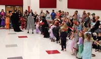 students and teachers in parade