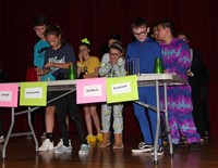 middle school students taking part in halloween activity