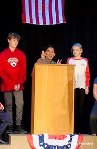 three students at musical practice