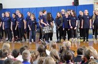 middle school students sharing performing brief sneak peek for Chenango Bridge students