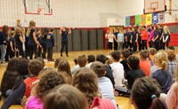 Port Dickinson Elementary students watching middle school students perform